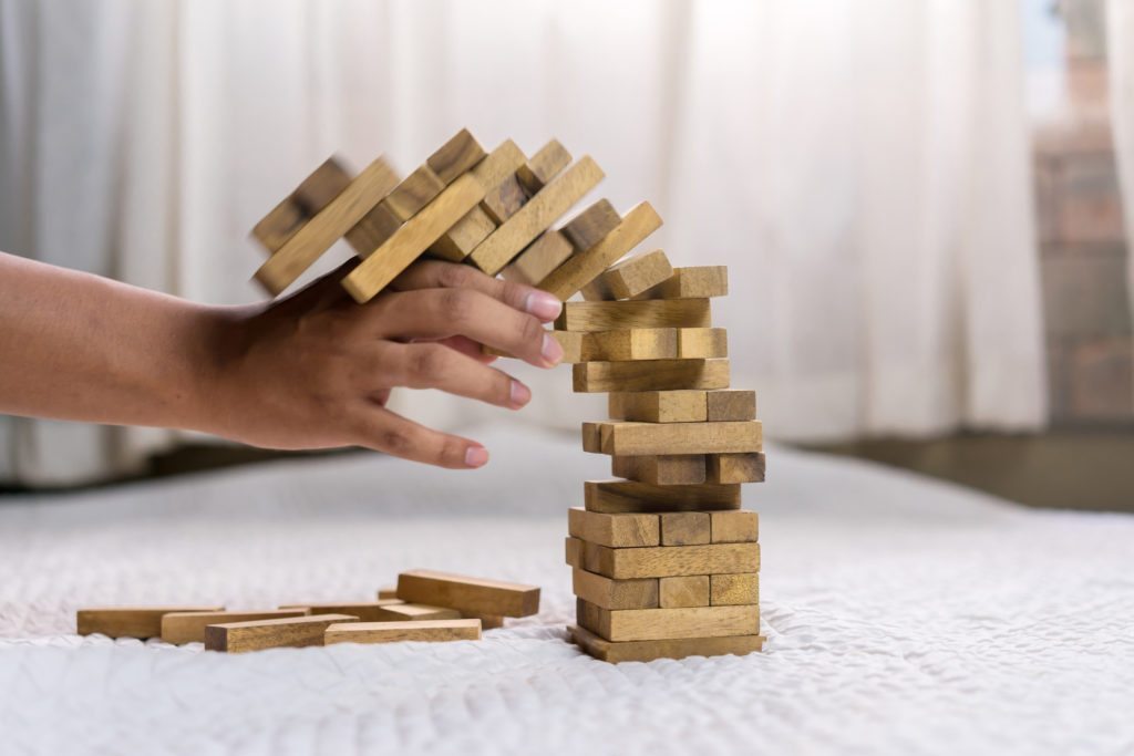Think real estate is like Jenga? Well...it can be if you're taking these steps toward a fail in real estate.