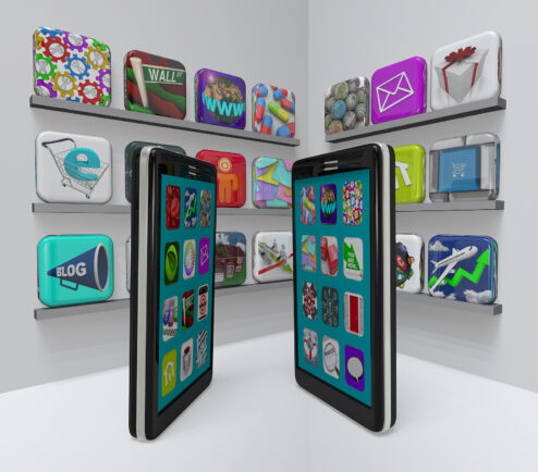 Two smart phones stand in an app store perusing the marketplace for new apps to download