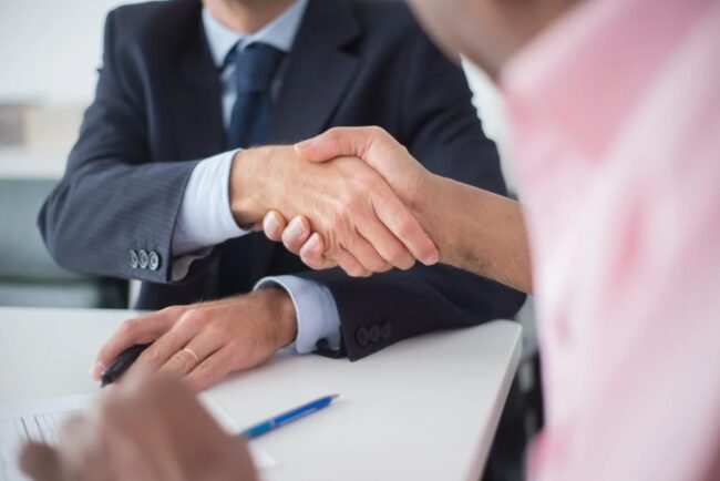 two real estate agents working together for the benefit of the client. Real Estate commissions and fees